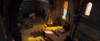 Movie still from “Fast & Furious” (2009), directed by Justin Lin – An empty church with a stained glass window and pews in the foreground; Extreme Wide shot, High angle