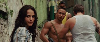 Movie still from “Fast Five” (2011), directed by Justin Lin – A group of men and women standing next to each other; Close Up shot, Over the shoulder angle