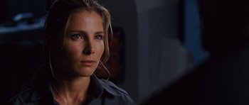 Movie still from “Fast Five” (2011), directed by Justin Lin – A person wearing a blue shirt; Close Up shot, Over the shoulder angle