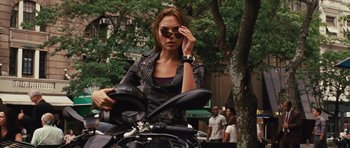 Movie still from “Fast Five” (2011), directed by Justin Lin – A woman on a motor bike in the street; Medium shot, Over the shoulder angle
