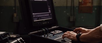 Movie still from “Fast Five” (2011), directed by Justin Lin – A person using a computer keyboard on a desk; Close Up shot, High angle