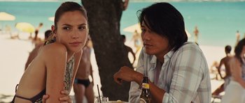 Movie still from “Fast Five” (2011), directed by Justin Lin – A man and a woman sitting at a table; Close Up shot, Over the shoulder angle