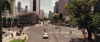 Movie still from “Fast Five” (2011), directed by Justin Lin – A busy street with cars and people crossing the street; Extreme Wide shot, High angle