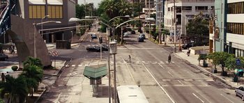 Movie still from “Fast Five” (2011), directed by Justin Lin – An empty city street with cars driving down the street; Extreme Wide shot, High angle