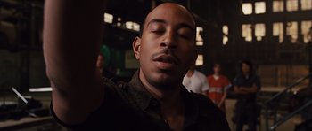 Movie still from “Fast Five” (2011), directed by Justin Lin – A person with his eyes closed; Close Up shot, Low angle