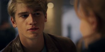 Movie still from “Fate: The Winx Saga” (2021), created by Brian Young – A person wearing a jacket; Close Up shot, Over the shoulder angle