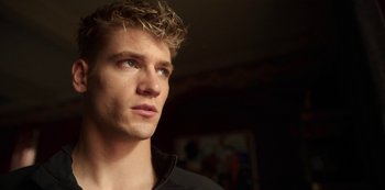 Movie still from “Fate: The Winx Saga” (2021), created by Brian Young – A person looking up at the sky; Close Up shot, Low angle