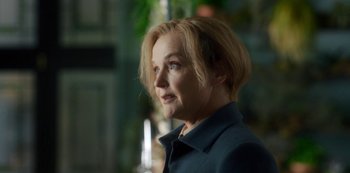 Movie still from “Fate: The Winx Saga” (2021), created by Brian Young – A person with short hair; Close Up shot, Over the shoulder angle