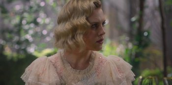 Movie still from “Fate: The Winx Saga” (2021), created by Brian Young – A person wearing a dress; Close Up shot, Over the shoulder angle