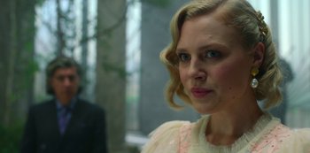 Movie still from “Fate: The Winx Saga” (2021), created by Brian Young – A person wearing a dress; Close Up shot, Over the shoulder angle