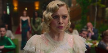 Movie still from “Fate: The Winx Saga” (2021), created by Brian Young – A person wearing a dress; Close Up shot, Over the shoulder angle