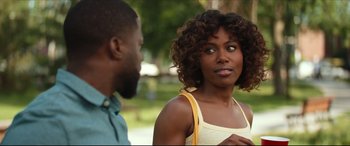 Movie still from “Fatherhood” (2021), directed by Paul Weitz – A woman and a man are talking to each other; Close Up shot, Over the shoulder angle