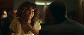 Movie still from “Fatherhood” (2021), directed by Paul Weitz – A person wearing a yellow shirt; Close Up shot, Over the shoulder angle