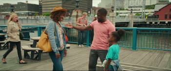 Movie still from “Fatherhood” (2021), directed by Paul Weitz – A man and a woman talking to a child; Medium shot, Over the shoulder angle