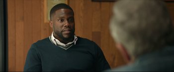 Movie still from “Fatherhood” (2021), directed by Paul Weitz – A person sitting in front of another person; Close Up shot, Over the shoulder angle