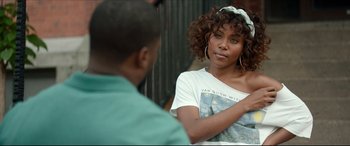 Movie still from “Fatherhood” (2021), directed by Paul Weitz – A woman in a white shirt is talking to a man; Close Up shot, Over the shoulder angle