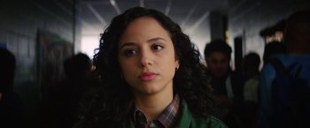 Movie still from “Fear Street: Part Two - 1978” (2021), directed by Leigh Janiak – A person with curly hair; Close Up shot, Low angle