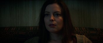 Movie still from “Fear Street: Part Two - 1978” (2021), directed by Leigh Janiak – A person with long hair; Close Up shot, Low angle