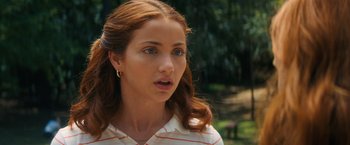 Movie still from “Fear Street: Part Two - 1978” (2021), directed by Leigh Janiak – A person with long red hair; Close Up shot, Over the shoulder angle