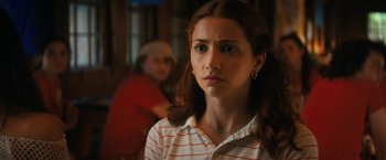 Movie still from “Fear Street: Part Two - 1978” (2021), directed by Leigh Janiak – A young woman is looking into the distance; Close Up shot, Over the shoulder angle