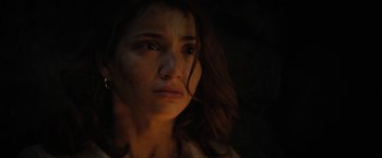 Movie still from “Fear Street: Part Two - 1978” (2021), directed by Leigh Janiak – A person looking at the camera; Close Up shot, Low angle