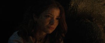 Movie still from “Fear Street: Part Two - 1978” (2021), directed by Leigh Janiak – A person with long brown hair; Close Up shot, Over the shoulder angle