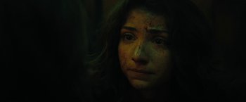 Movie still from “Fear Street: Part Two - 1978” (2021), directed by Leigh Janiak – A person's face in the dark; Close Up shot, High angle