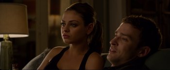 Movie still from “Friends with Benefits” (2011), directed by Will Gluck – A woman sitting next to a man in front of a window; Close Up shot, Over the shoulder angle