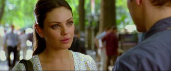 Movie still from “Friends with Benefits” (2011), directed by Will Gluck – A person wearing a white shirt; Close Up shot, Over the shoulder angle