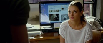 Movie still from “Friends with Benefits” (2011), directed by Will Gluck – A woman sitting in front of a computer monitor; Close Up shot, Over the shoulder angle