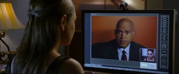 Movie still from “Friends with Benefits” (2011), directed by Will Gluck – A woman sitting in front of a computer screen; Close Up shot, Over the shoulder angle