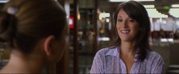 Movie still from “Friends with Benefits” (2011), directed by Will Gluck – A woman in a purple shirt is talking to a man; Close Up shot, Over the shoulder angle