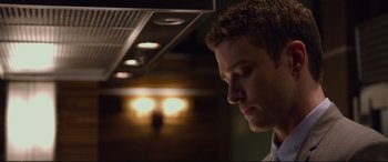 Movie still from “Friends with Benefits” (2011), directed by Will Gluck – A person in a kitchen near a stove; Close Up shot, Low angle