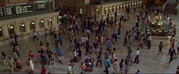 Movie still from “Friends with Benefits” (2011), directed by Will Gluck – A large group of people are gathered together in a building; Extreme Wide shot, High angle