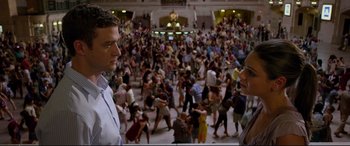 Movie still from “Friends with Benefits” (2011), directed by Will Gluck – Two men standing next to each other in front of a crowd of onlookers; Wide shot, High angle