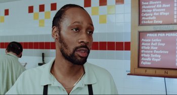 Movie still from “Funny People” (2009), directed by Judd Apatow – A person in a kitchen; Close Up shot, High angle