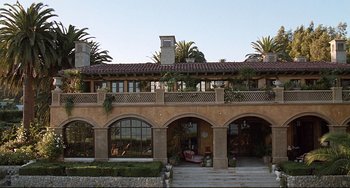 Movie still from “Funny People” (2009), directed by Judd Apatow – A building that has a lot of windows on it; Extreme Wide shot, Low angle