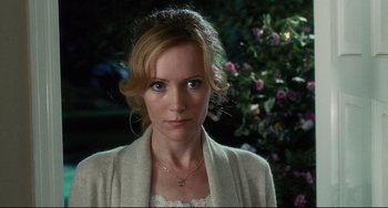 Movie still from “Funny People” (2009), directed by Judd Apatow – A person wearing a sweater; Close Up shot, Over the shoulder angle