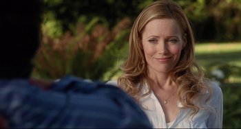 Movie still from “Funny People” (2009), directed by Judd Apatow – A person wearing a white shirt; Close Up shot, Over the shoulder angle