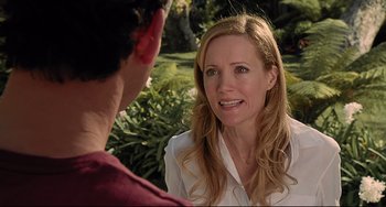 Movie still from “Funny People” (2009), directed by Judd Apatow – A man and a woman talking to each other outside; Close Up shot, Over the shoulder angle