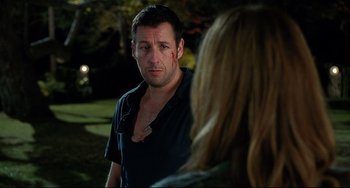 Movie still from “Funny People” (2009), directed by Judd Apatow – A man with blood all over his face is talking to a woman; Close Up shot, Over the shoulder angle