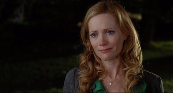 Movie still from “Funny People” (2009), directed by Judd Apatow – A person wearing a green shirt; Close Up shot, Over the shoulder angle