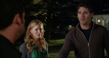 Movie still from “Funny People” (2009), directed by Judd Apatow – A man and a woman standing next to each other; Medium shot, Over the shoulder angle