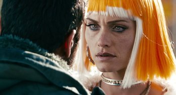 Movie still from “Gamer” (2009), directed by Mark Neveldine – A man and a woman looking into each other's eyes; Close Up shot, Over the shoulder angle