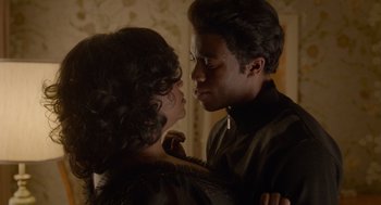 Movie still from “Get on Up” (2014), directed by Tate Taylor – A man and a woman are kissing in a room; Close Up shot, Over the shoulder angle