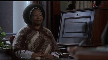 Movie still from “Girl, Interrupted” (1999), directed by James Mangold – An older woman sitting in front of a piano; Medium shot, Over the shoulder angle