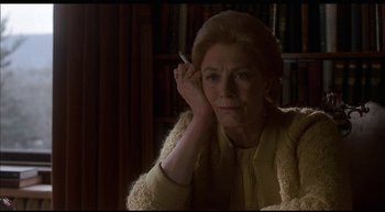 Movie still from “Girl, Interrupted” (1999), directed by James Mangold – An older woman with a cigarette in her mouth; Close Up shot, High angle