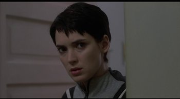 Movie still from “Girl, Interrupted” (1999), directed by James Mangold – A person with short black hair; Close Up shot, Low angle