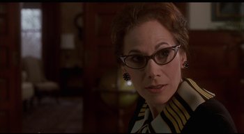 Movie still from “Girl, Interrupted” (1999), directed by James Mangold – A person wearing glasses; Close Up shot, Low angle