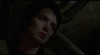 Movie still from “Girl, Interrupted” (1999), directed by James Mangold – A person looking at the camera; Close Up shot, Low angle